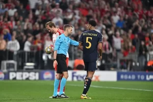 Kane Shuns Bellingham Amid Champions League Penalty Drama