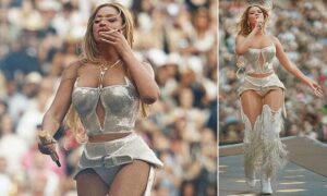 Singer Beyonce smokes a cigarette onstage during final stadium concert in Paris (Photos)
