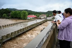 30 de@d following heavy rains in Chinese capital
